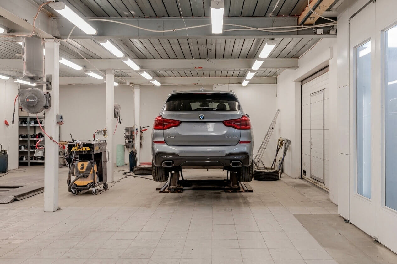 Car raised on a lift for diagnostics